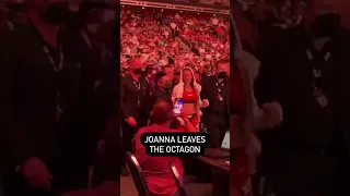 Joanna Jędrzejczyk walks out of the octagon after announcing her retirement at #ufc275