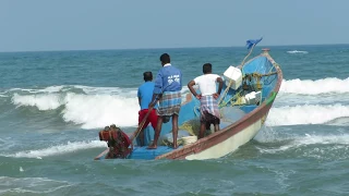 Indian fishing boat gets in to the sea