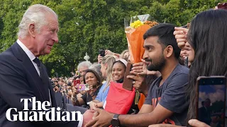 King Charles III greets crowds outside Buckingham Palace