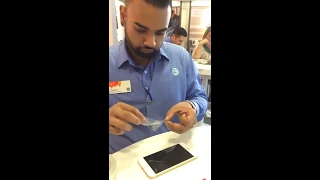 Unintentional ASMR- Employee applying screen protector