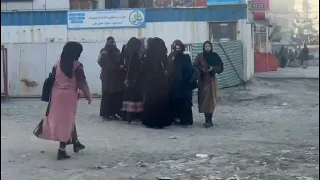 Afghan women near university after Taliban bans higher education for women | AFP