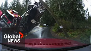Dashcam captures dump truck falling onto BC man's car
