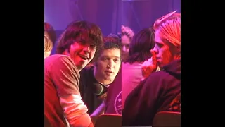 Dave Grohl, Taylor Hawkins react to crowd cheering outside MuchMusic during 2002 Strombo interview.