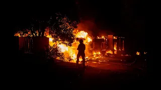 Firefighters battling burning homes as Carr Fire rages in Redding, California