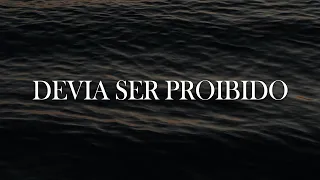 Henrique e Juliano - DEVIA SER PROIBIDO (Lyrics) | Official Music Video