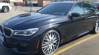 executive bmw 750I clean on 24's staggered rims