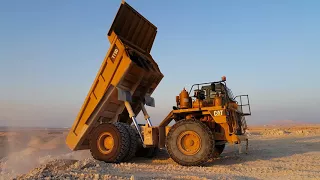 4K | Cat 773D Off-Highway Truck | Hauling and dumping rock material