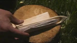 Ray Mears - How to carve a needle and gauge for net making, Northern WIlderness