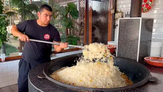 Young cook is preparing Uzbek pilaf in many pots | Pilaf City | Osh city
