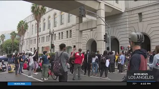 Protestors gather around LA City Hall to call for change in wake of leaked audio scandal