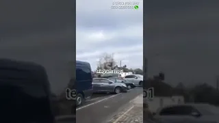 Russian tanks crushing cars in Ukraine