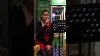 FILIPINA SINGS CHINESE SONG YONG QI