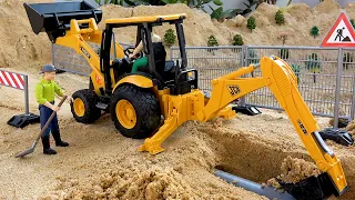 Backhoe Loader Working at Construction Site | BIBO STUDIO