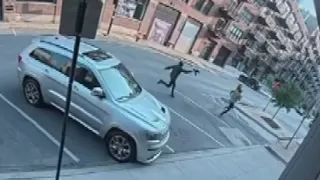 Surveillance video shows gunman chase victim in violent River North shooting