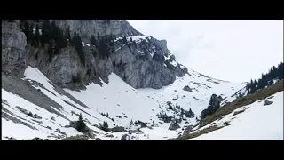 Carthusian monks glissading down the mountain [Into Great Silence 2005]