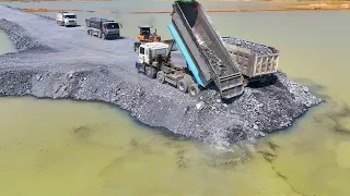 Super Project Building Long Road on Water by Equipment Machine Bulldozer & Truck Spreading Big Rock