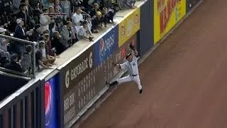 Ichiro leaps at the wall for a stellar grab