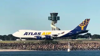 Atlas B747-400F arrives in Sydney on runway 34L. Jetstar B787-8 departs