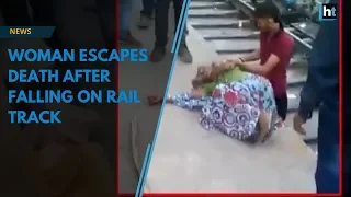 Woman escapes death after falling between train and platform in Allahabad