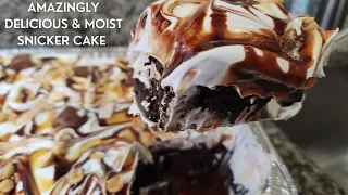 Delicious and Moist Snickers Cake Made From A Box Cake Mix