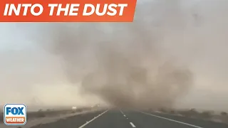 Storm Chaser Drives Through Dust Devil