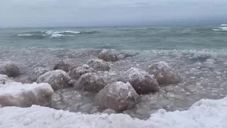 Ice spheres rolling onto Indiana shores