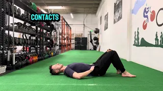 Hooklying left hip shift right arm reach