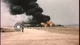 Fire fighting men spray water as a B-29 Superfortress catches fire while landing ...HD Stock Footage