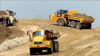 Building coastal protection | CAT 740B EJ / 972K / 347D / Volvo A40E | Waterdunen Breskens Holland