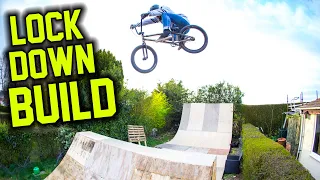 RIDING BMX BACKYARD SPINE JUMP!!