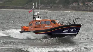 Lifeboat launches into the sea, and gets recovered by a large tractor