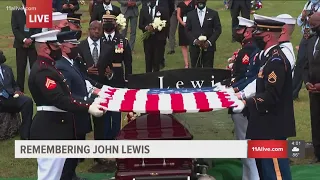 'Taps' played a cemetery for  John Lewis