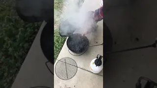 6  Putting out the charcoal in small pot grill