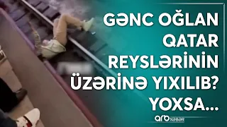 Bakı metrosunda dəhşətli anlar yaşandı: İnsanlar reyslərin üzərindəki oğlanı xilas etməyə çalışdı