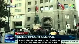 Chileans march to remember 9-11, the coup anniversary