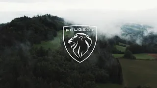 Peugeot 508GT in the Misty Mountains: A Foggy Morning Drive Captured with Camera and Drone