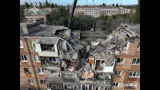 A young boy is pulled from rubble in Ukraine following Russian shelling