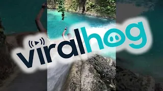 Enjoying the Natural Waterslide in Kawasan Falls || ViralHog