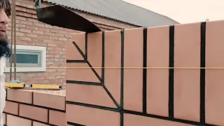 Стройка в Чеченском стиле, окантовка гаражных ворот. Кладка кирпича. Brick edging of garage doors.