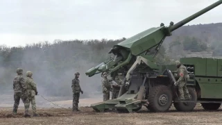 Danish troops firing  CAESAR  8x8 self-propelled artillery system