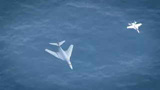 Supersonic B-1 Bomber Flyover of 3 Nimitz Class Aircraft Carriers