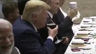 2019 G20 dinner,Putin toasted Trump with thermo cup