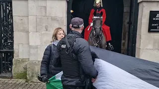 Free Palestine protesters try to disrupt horse guards quickly shut down by armed MOD police.