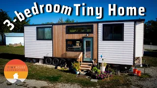 Living her best life in stunning Tiny House with 3 standing bedrooms!