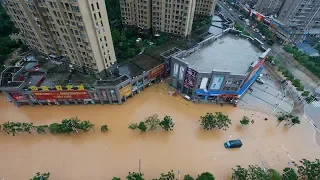 Rain triggered flooding force evacuations, disrupts traffic in east China