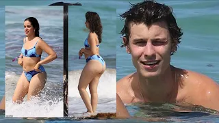 Camila Cabello makes a splash in thong bikini while boyfriend Shawn Mendes strips off his shirt...