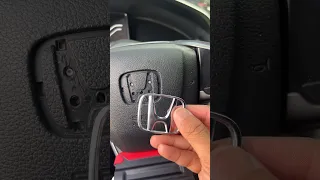 How to remove Honda Civic emblem on steering wheel?