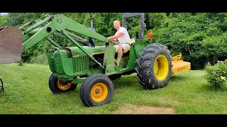 Roofing cheat code... John Deere 2040 tractor with loader.