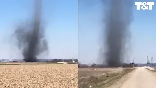 Man Gets Up Close To Towering Dust Devil