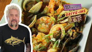 Guy Fieri Eats Brazilian Seafood Moqueca | Diners, Drive-ins and Dives with Guy Fieri | Food Network